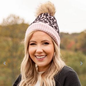 Wild And Fierce Beanie with leopard print with pom pom on top so cute